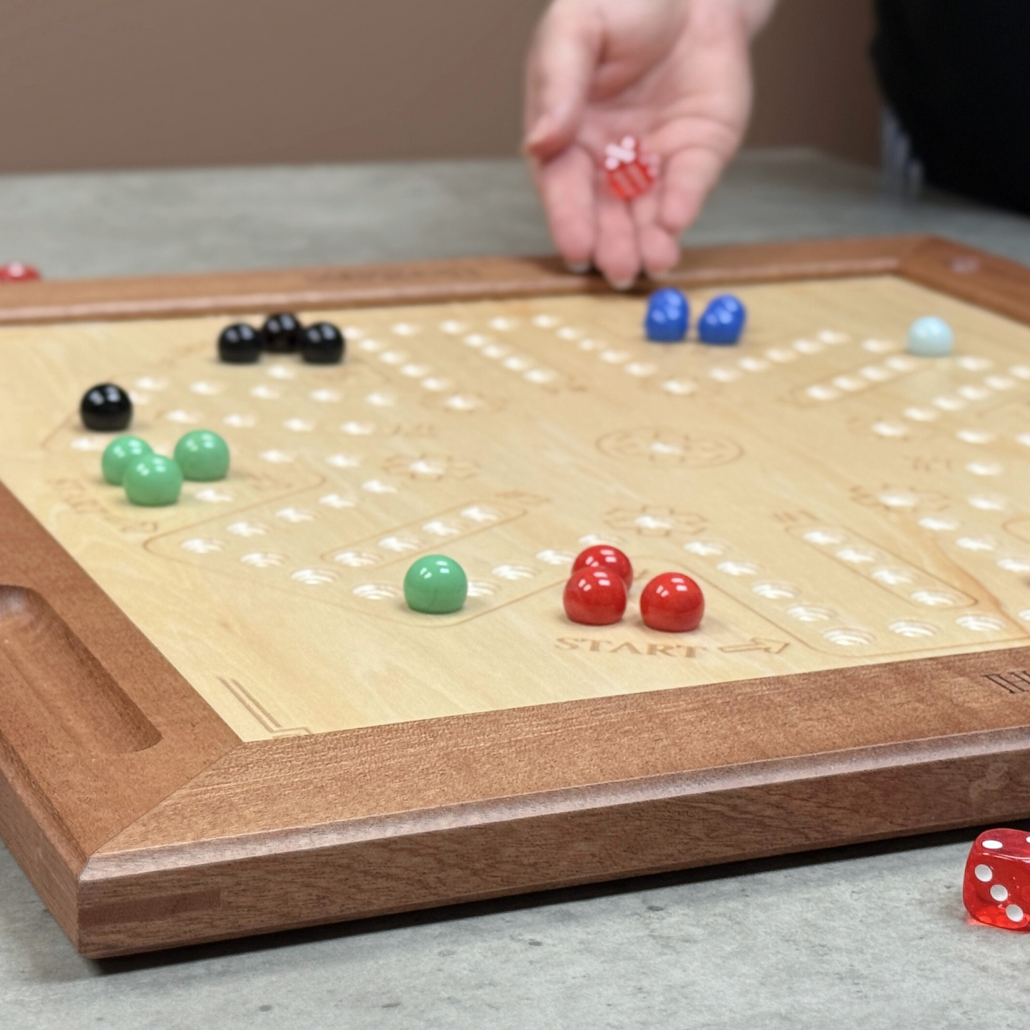 Wooden board game with colorful pieces on a table